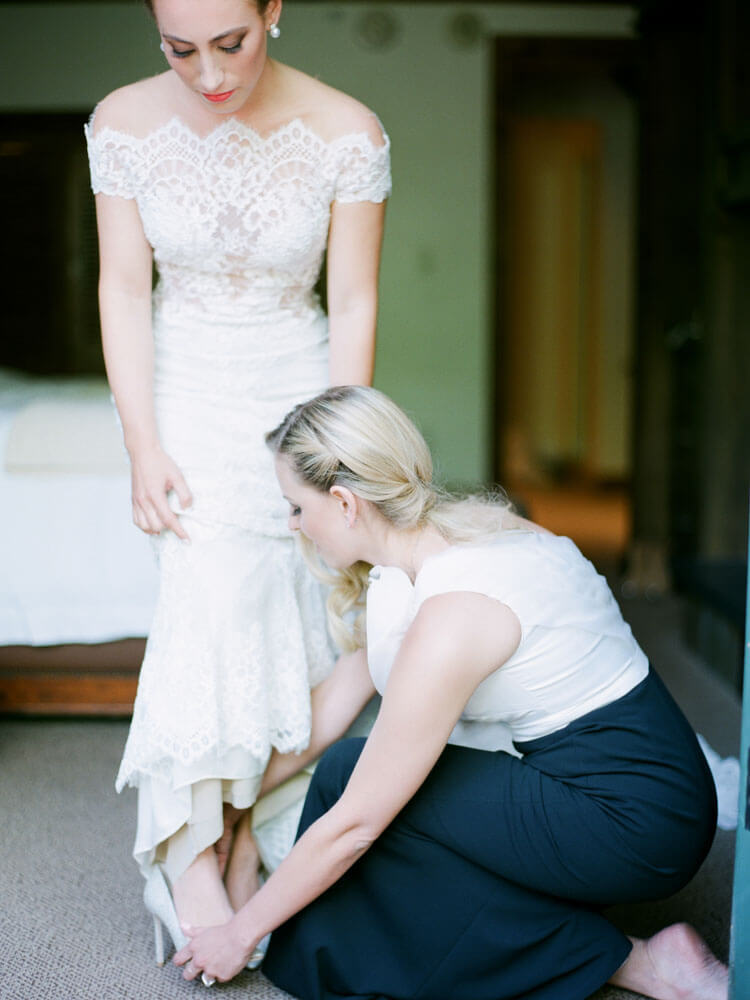 Aspen Mountain Wedding bride and bridesmaid getting ready photography by Tara Marolda